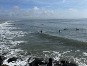 Surfer in water waiting for wave.