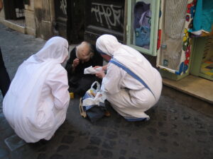 Who is my neighbor? Missionaries of Charity care for homeless man on streets of Rome. 2010