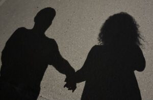 shadows holding hands